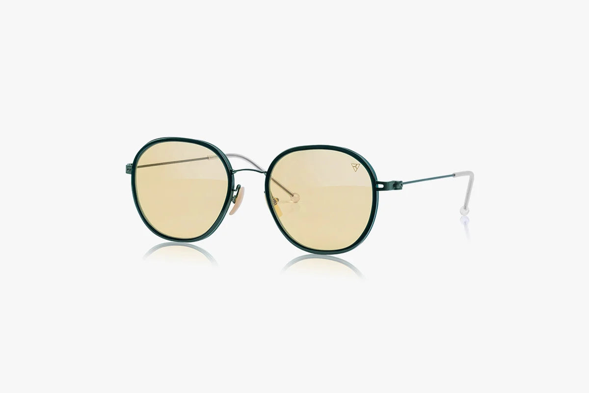 ZEPTER KSA Middle East Round sunglasses with gold lenses and green frames on a white background